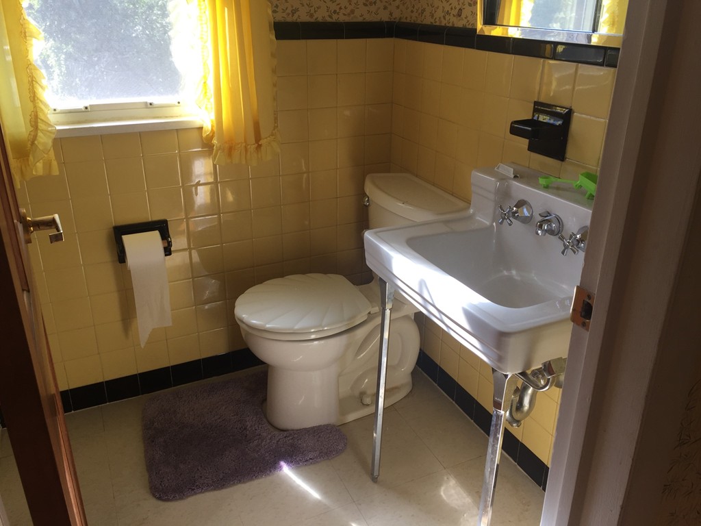 79 Haller Street Springfield, MA 01151 - Photo 6 of 26 a bathroom with a sink and a toilet