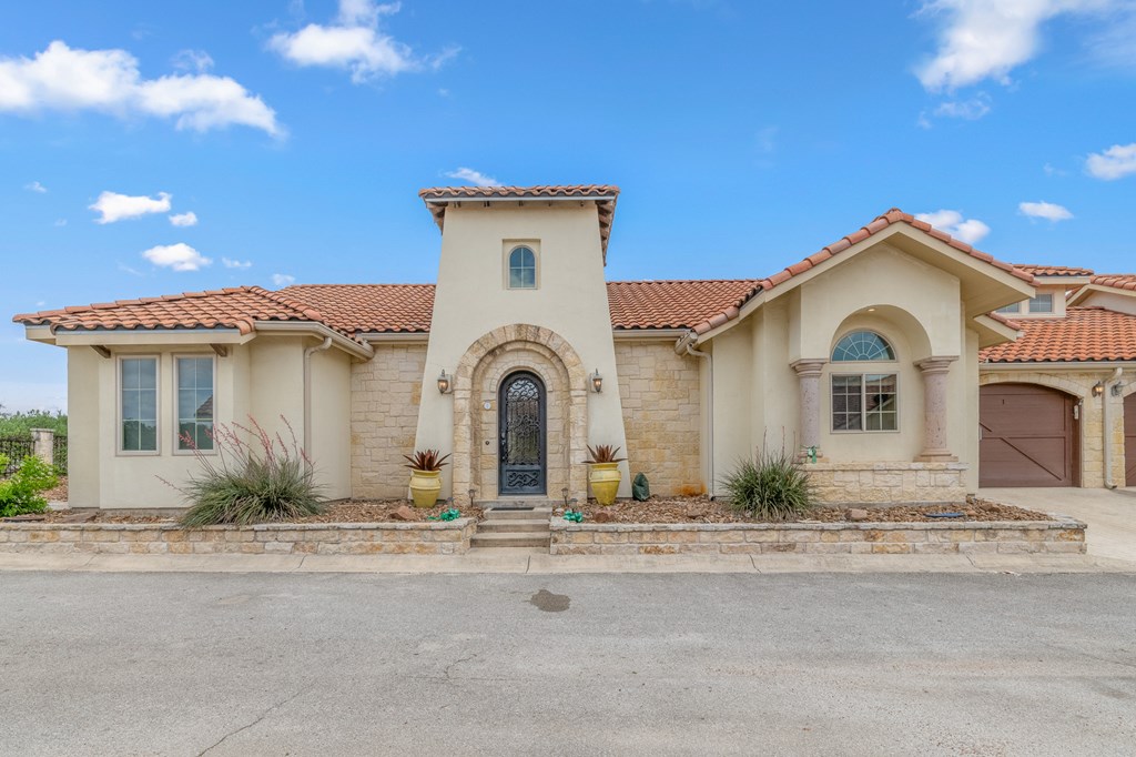 3801-1 Club House Road Kerrville, TX 78028 - Photo 26 of 26 a front view of a house with a yard