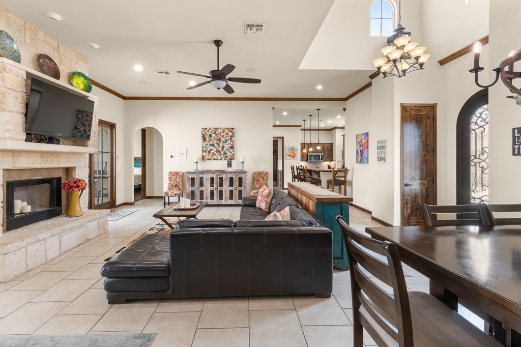 3801-1 Club House Road Kerrville, TX 78028 - Photo 4 of 26 a living room with furniture and a fireplace