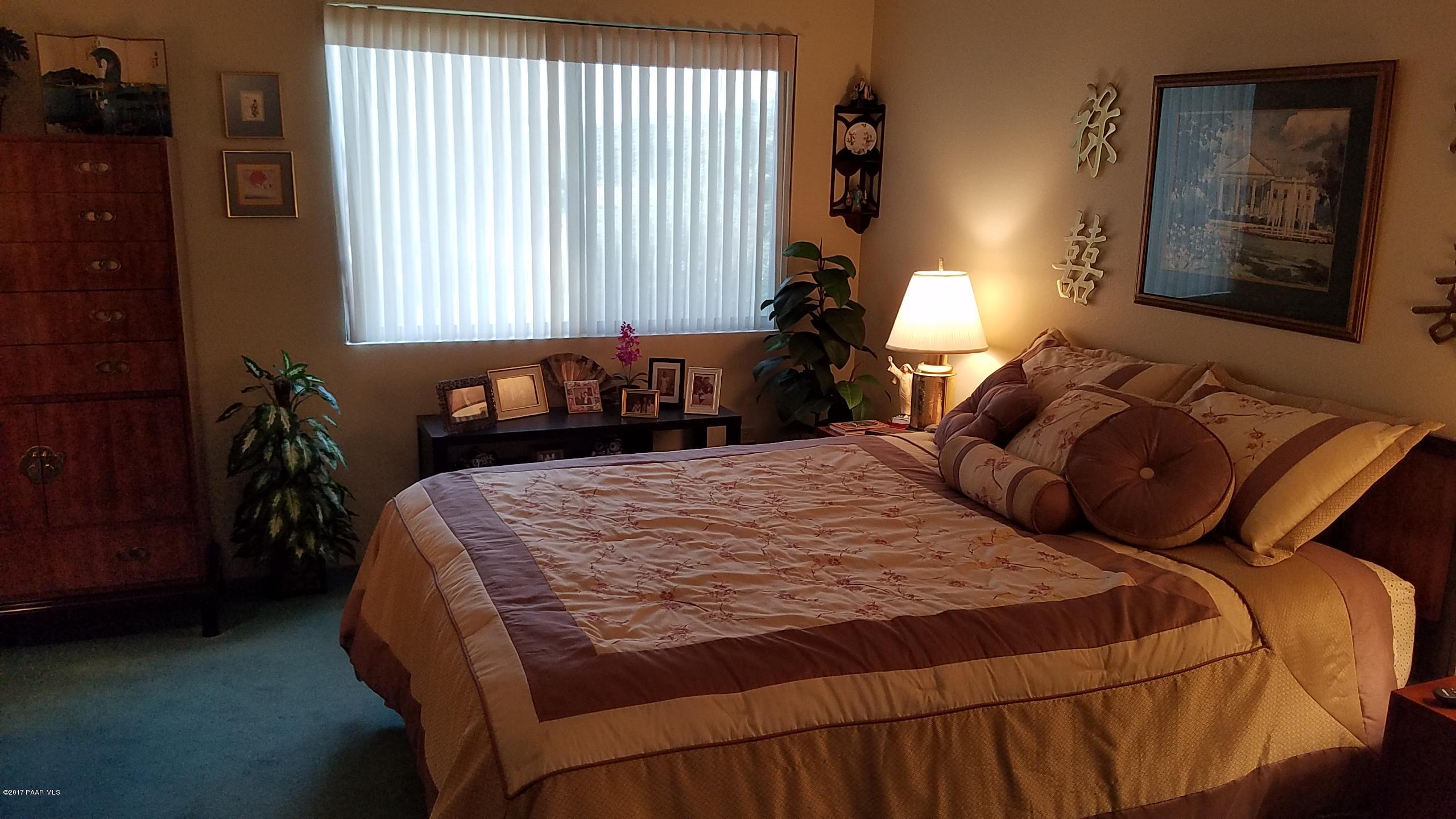 428 River Oaks Road Prescott, AZ 86301 - Photo 11 of 17 a bedroom with a bed and window