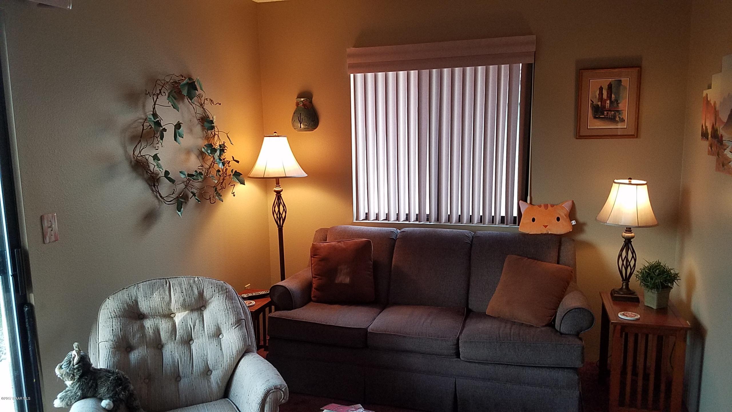 428 River Oaks Road Prescott, AZ 86301 - Photo 15 of 17 a living room with furniture and a window