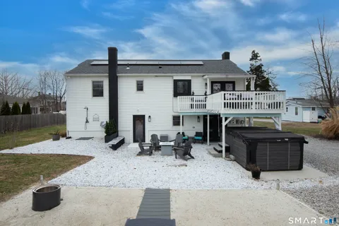 a outdoor living space with furniture and a potted plant