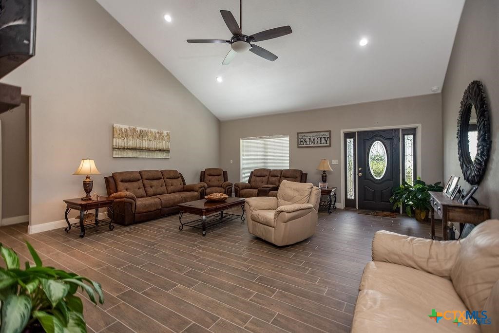802 Mc Donald Road Port Lavaca, TX 77979 - Photo 12 of 45 a living room with furniture and a window