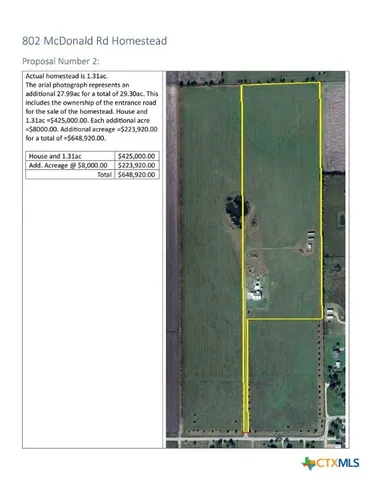 a picture of a bathroom with a shower and a sink