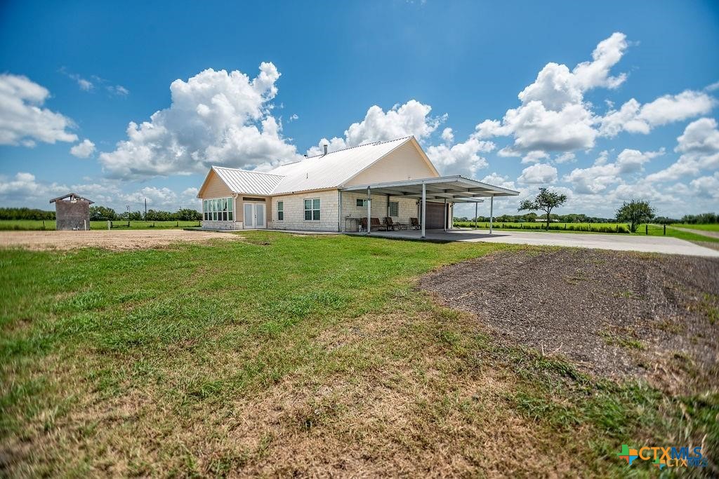 802 Mc Donald Road Port Lavaca, TX 77979 - Photo 39 of 44 a view of a big house with a big yard and a large tree
