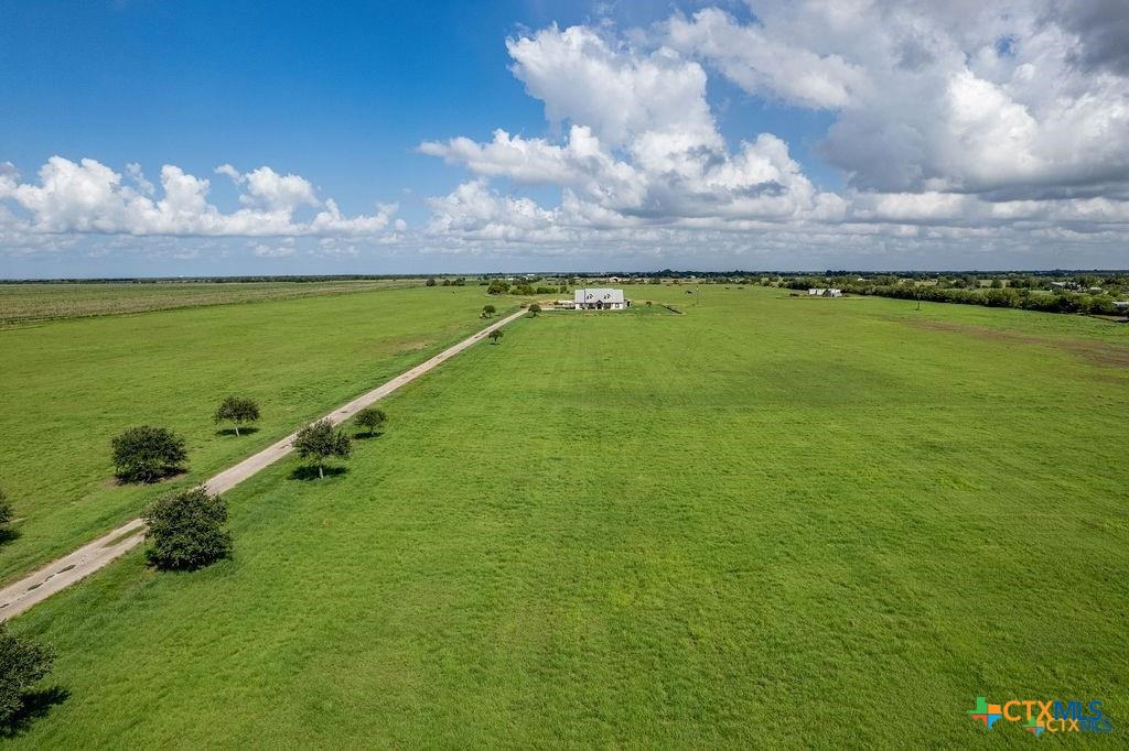 802 Mc Donald Road Port Lavaca, TX 77979 - Photo 43 of 45 a view of a lake and a yard