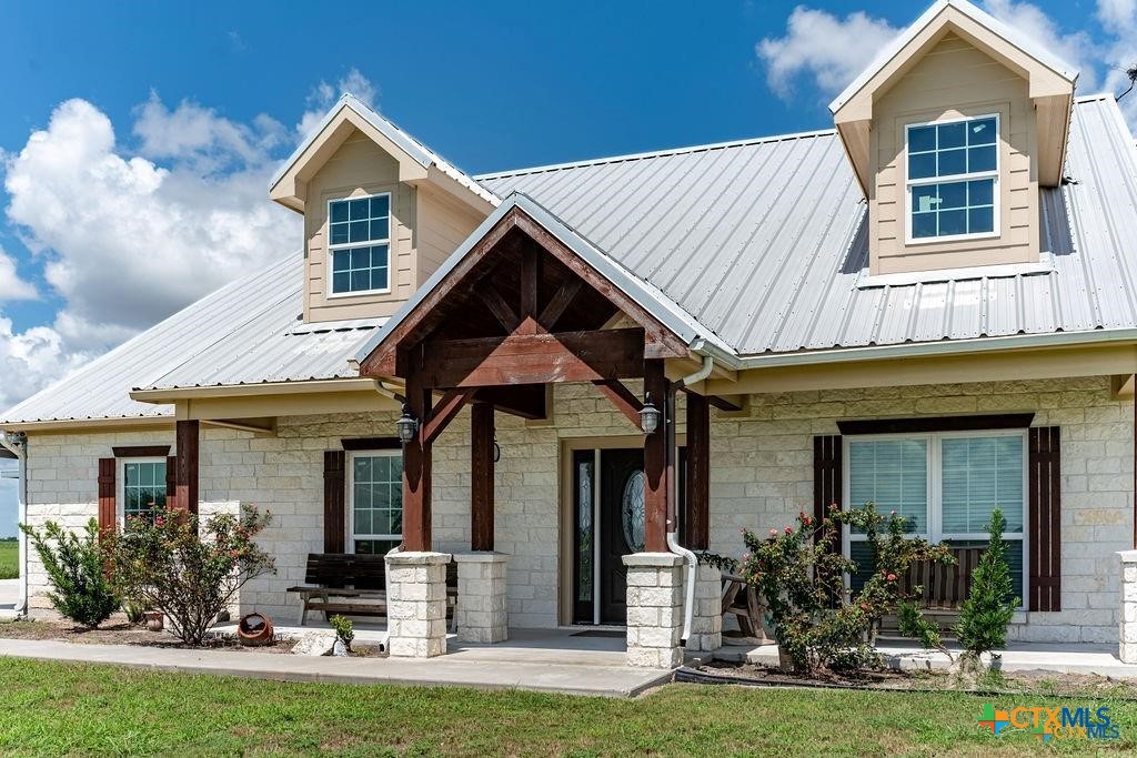 802 Mc Donald Road Port Lavaca, TX 77979 - Photo 7 of 45 a front view of a house with garden