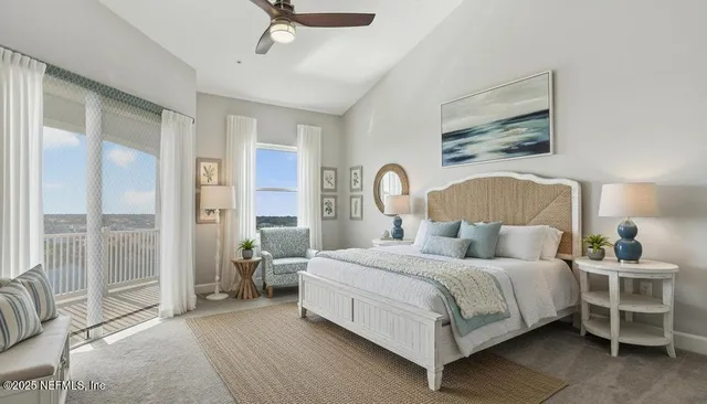 a view of a balcony with chair and potted plants