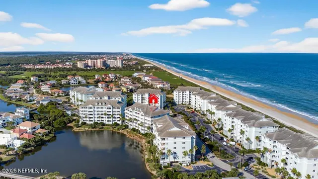 a view of a swimming pool with a lounge chair