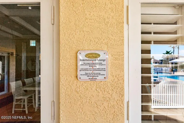 a kitchen with appliances a sink and cabinets