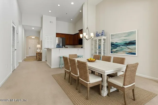 a spacious bathroom with a double vanity sink and a mirror