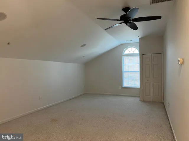 a view of hallway with windows
