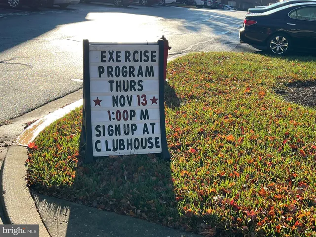 a bathroom with a shower and a door