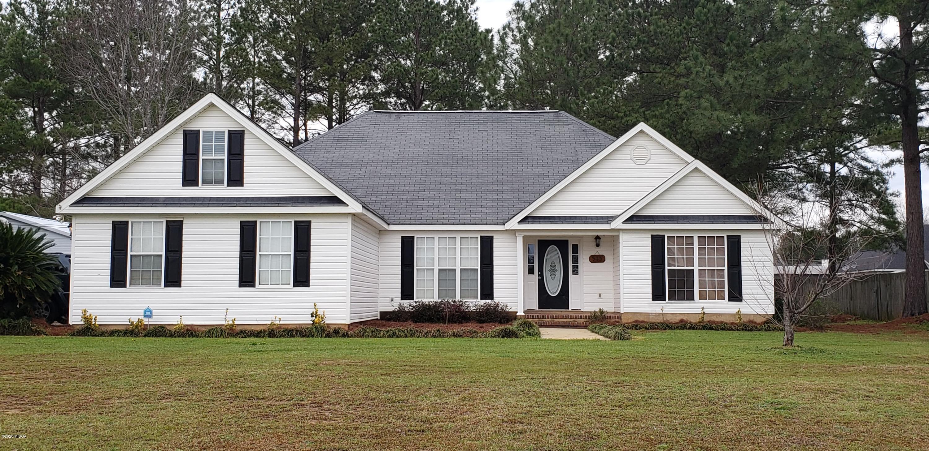 515 Amanda Way Macon, GA 31216 - Photo 2 of 33 a front view of a house with a garden