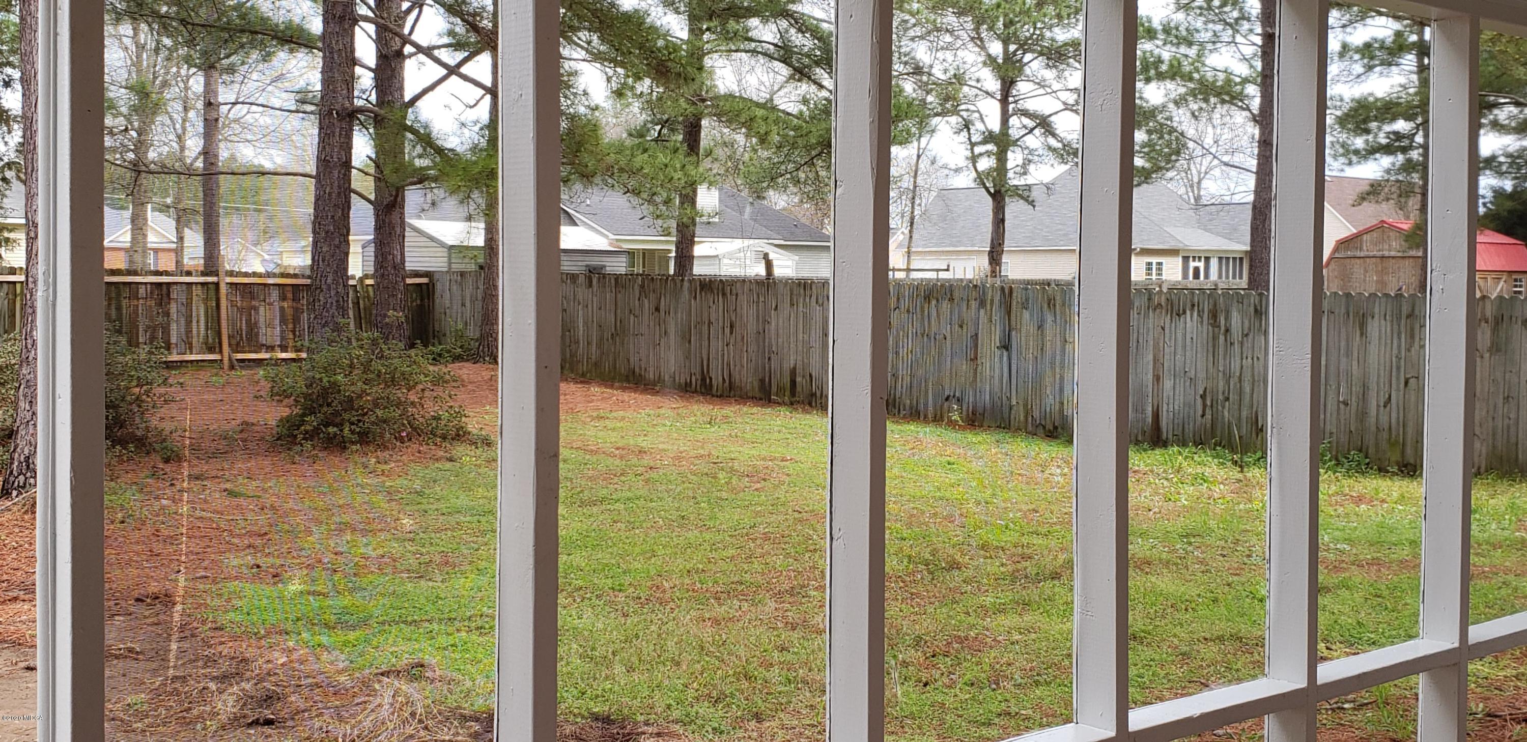 515 Amanda Way Macon, GA 31216 - Photo 31 of 33 a view of a glass door and porch