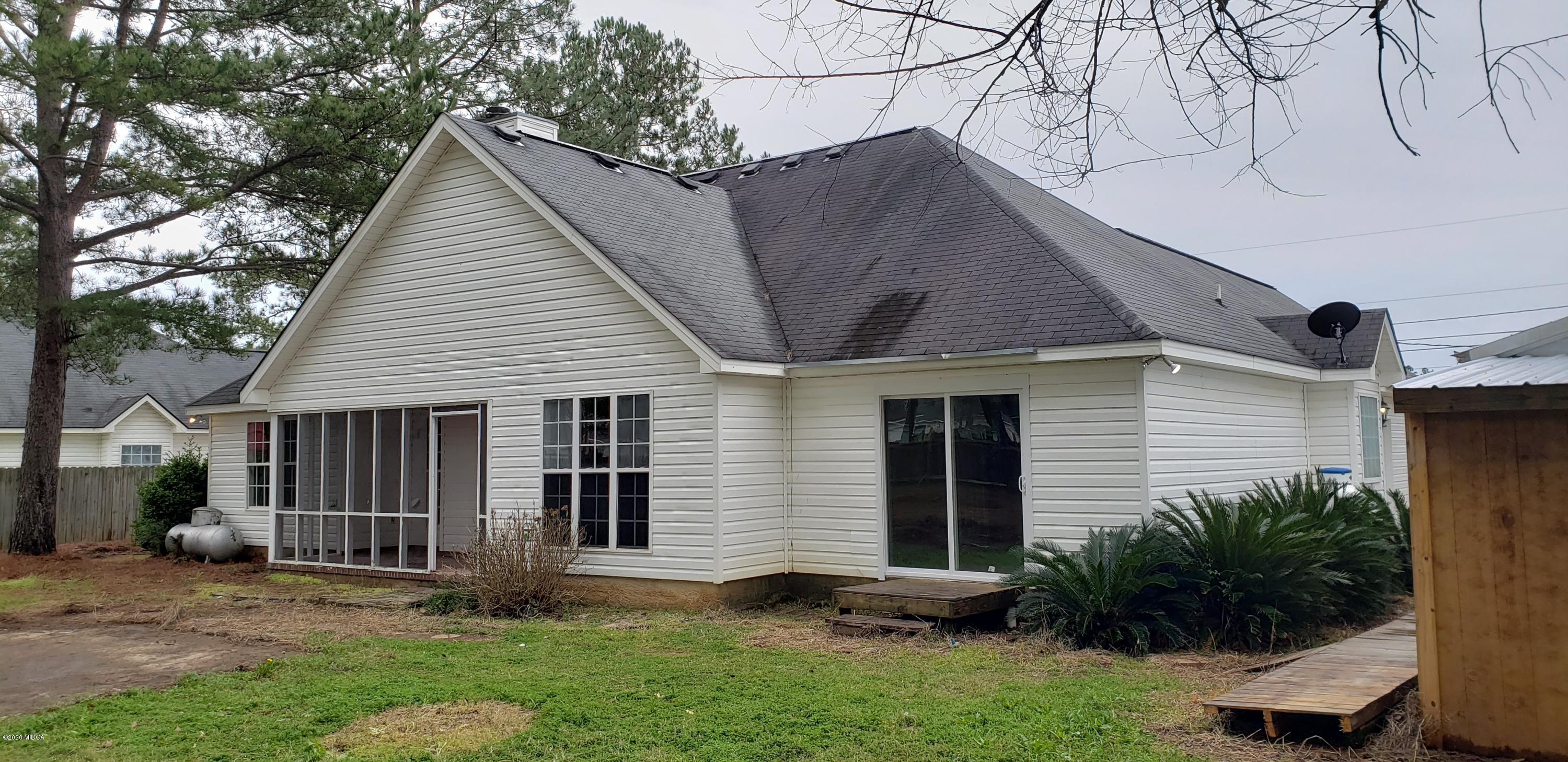 515 Amanda Way Macon, GA 31216 - Photo 33 of 33 a view of a house with a yard and plants