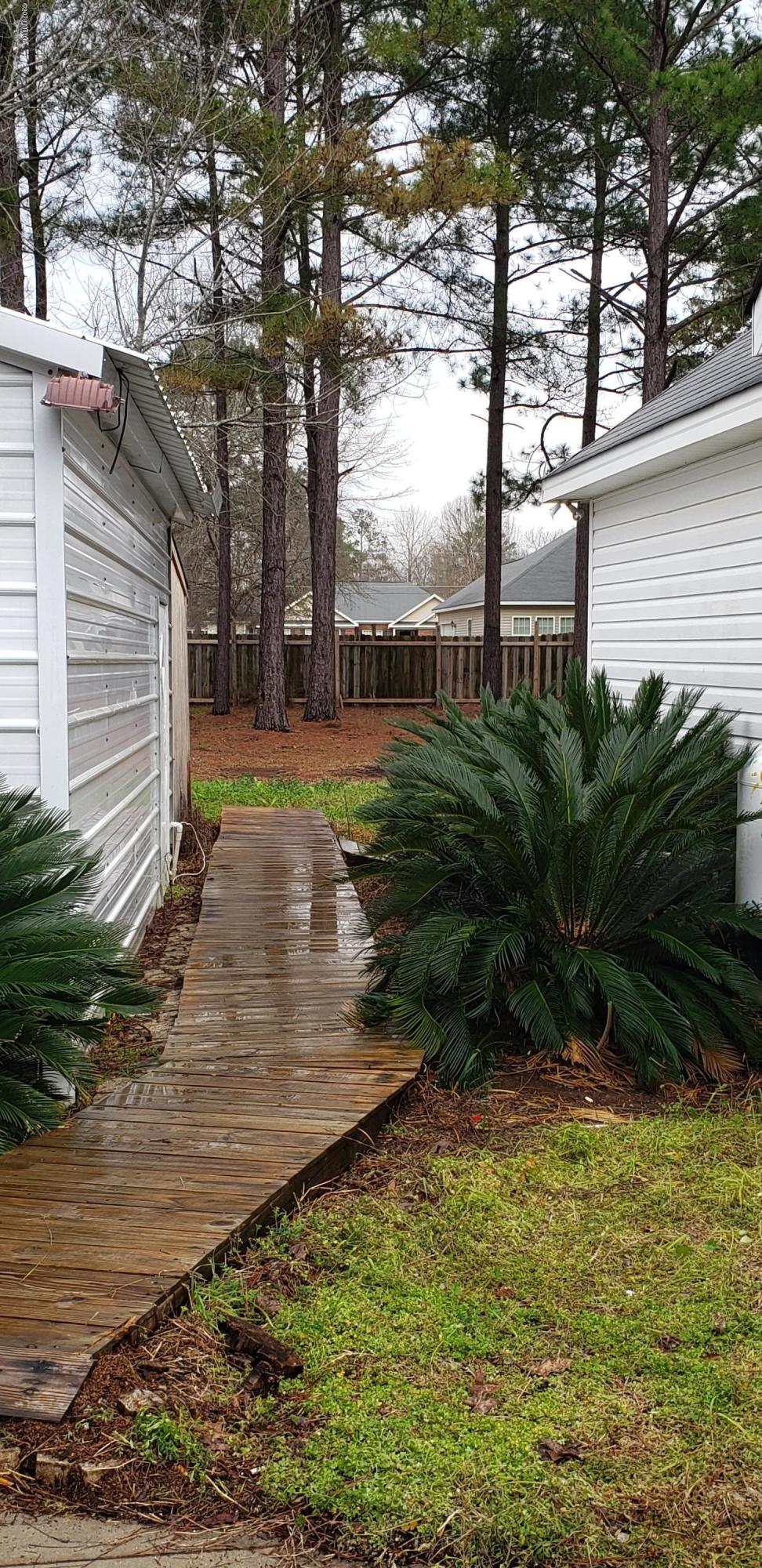 515 Amanda Way Macon, GA 31216 - Photo 5 of 33 a view of a backyard of the house
