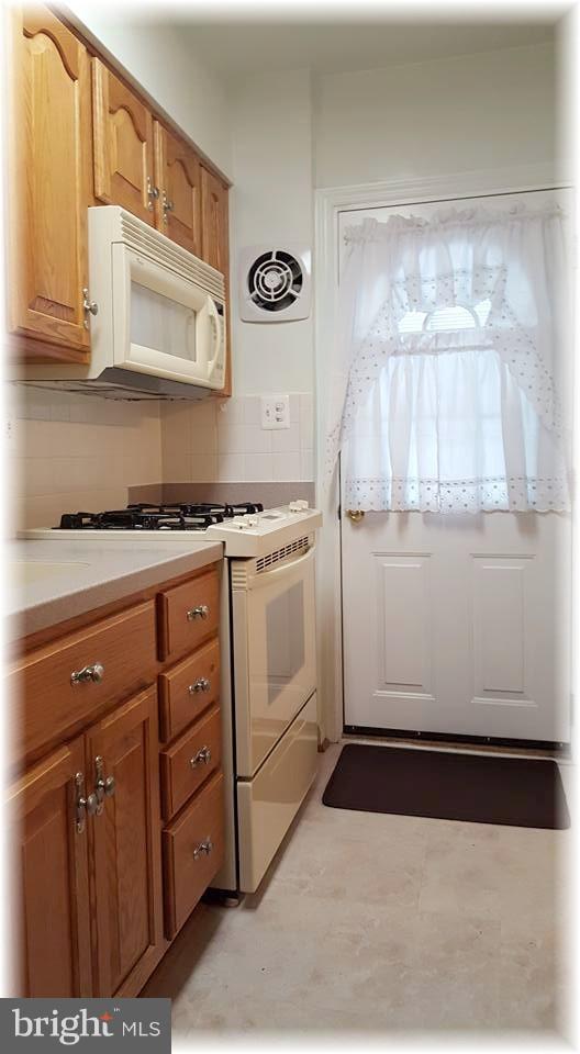 8308 Dalesford Road Baltimore, MD 21234 - Photo 11 of 25 Kitchen exits to the yard.