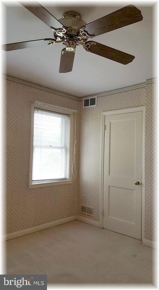8308 Dalesford Road Baltimore, MD 21234 - Photo 14 of 25 Front bedroom offers a variable speed ceiling fan.