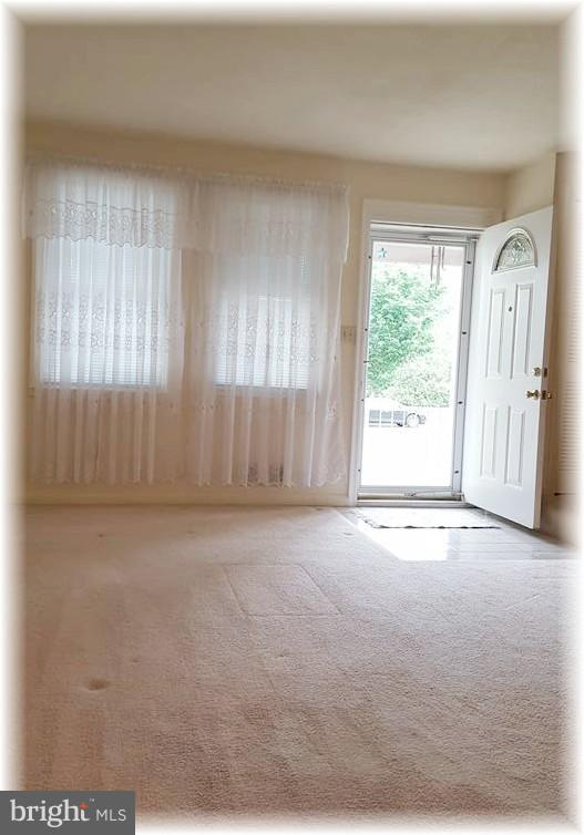 8308 Dalesford Road Baltimore, MD 21234 - Photo 6 of 25 Sunlit living space is very inviting.