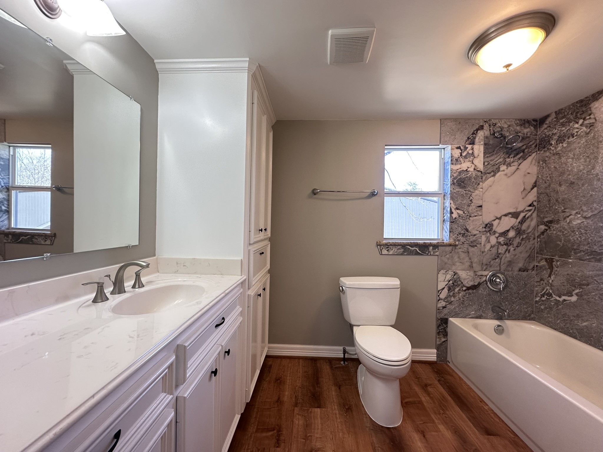 13868 Cedar Hill Road Montgomery, TX 77356 - Photo 10 of 19 a bathroom with a toilet a sink and a bathtub