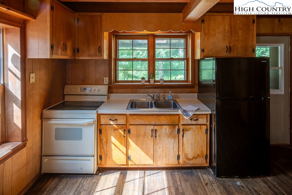 492 Payne Branch Road Boone, NC 28607 - Photo 16 of 49 a kitchen with stainless steel appliances granite countertop a refrigerator and a stove