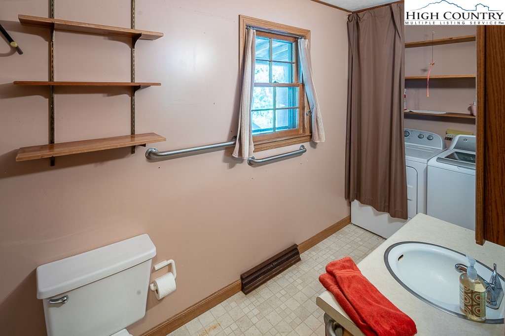 492 Payne Branch Road Boone, NC 28607 - Photo 18 of 49 a bathroom with a sink and a mirror