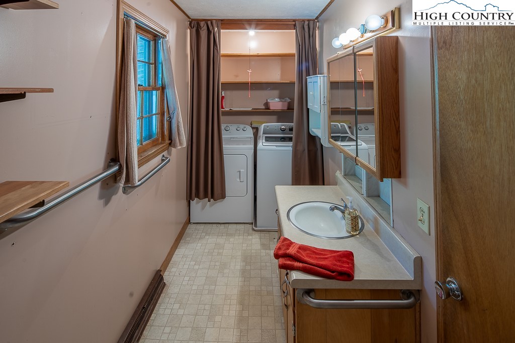 492 Payne Branch Road Boone, NC 28607 - Photo 19 of 49 a bathroom with a sink and a mirror