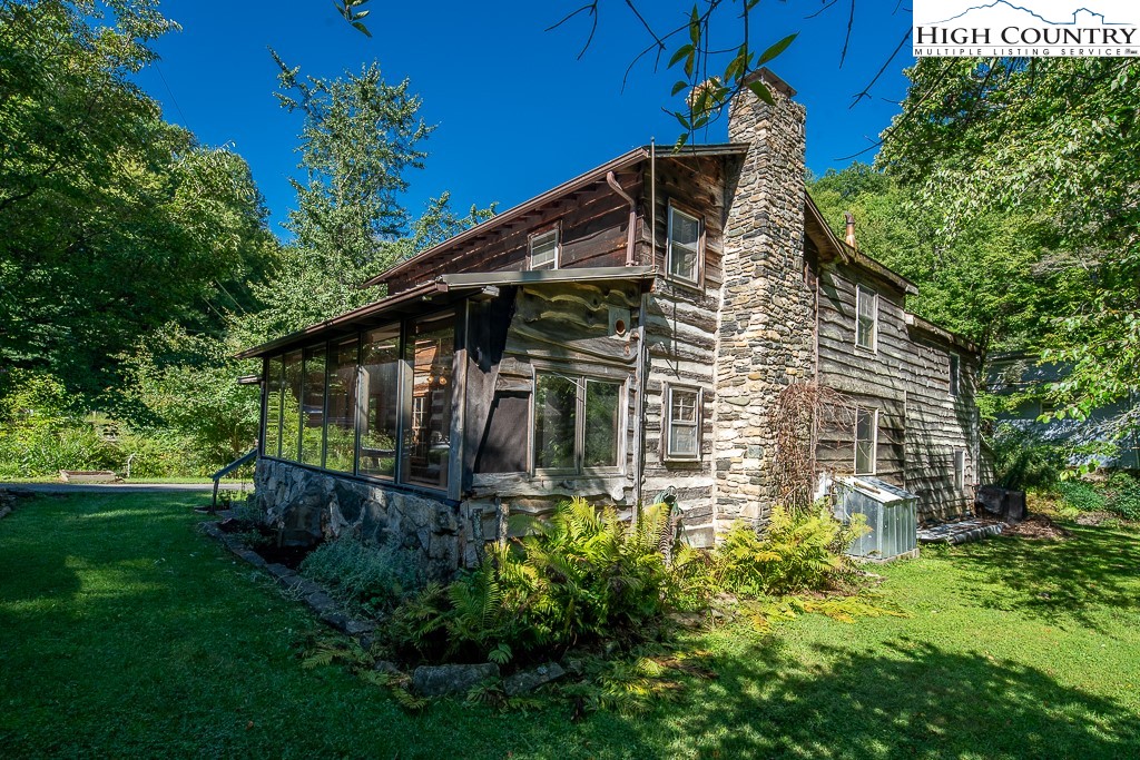 492 Payne Branch Road Boone, NC 28607 - Photo 3 of 49 a front view of a house with a yard