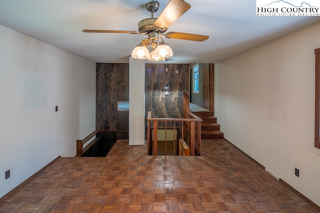 492 Payne Branch Road Boone, NC 28607 - Photo 31 of 49 a view of dining room with furniture and chandelier fan