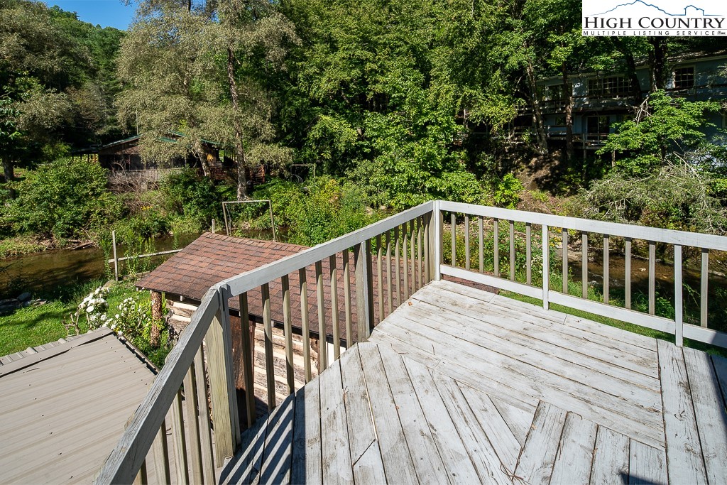 492 Payne Branch Road Boone, NC 28607 - Photo 32 of 49 a view of balcony with deck and trees