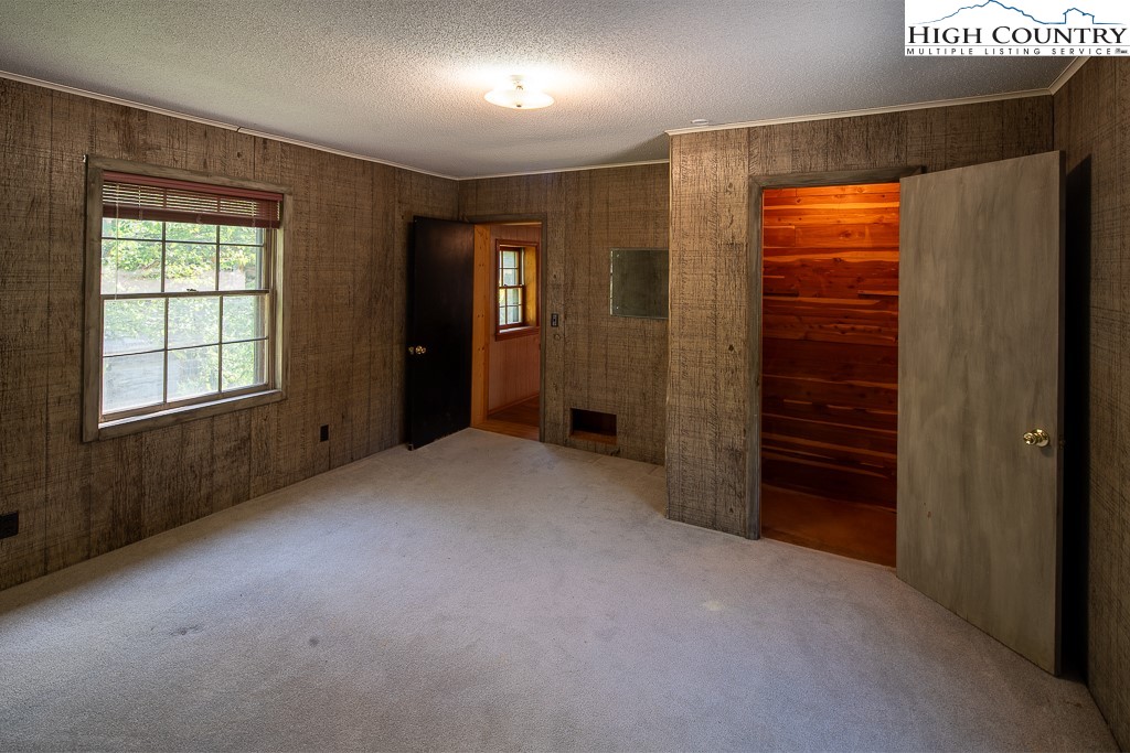 492 Payne Branch Road Boone, NC 28607 - Photo 35 of 49 an empty room with windows and closet