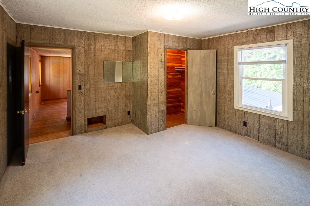 492 Payne Branch Road Boone, NC 28607 - Photo 36 of 49 an empty room with windows and closet