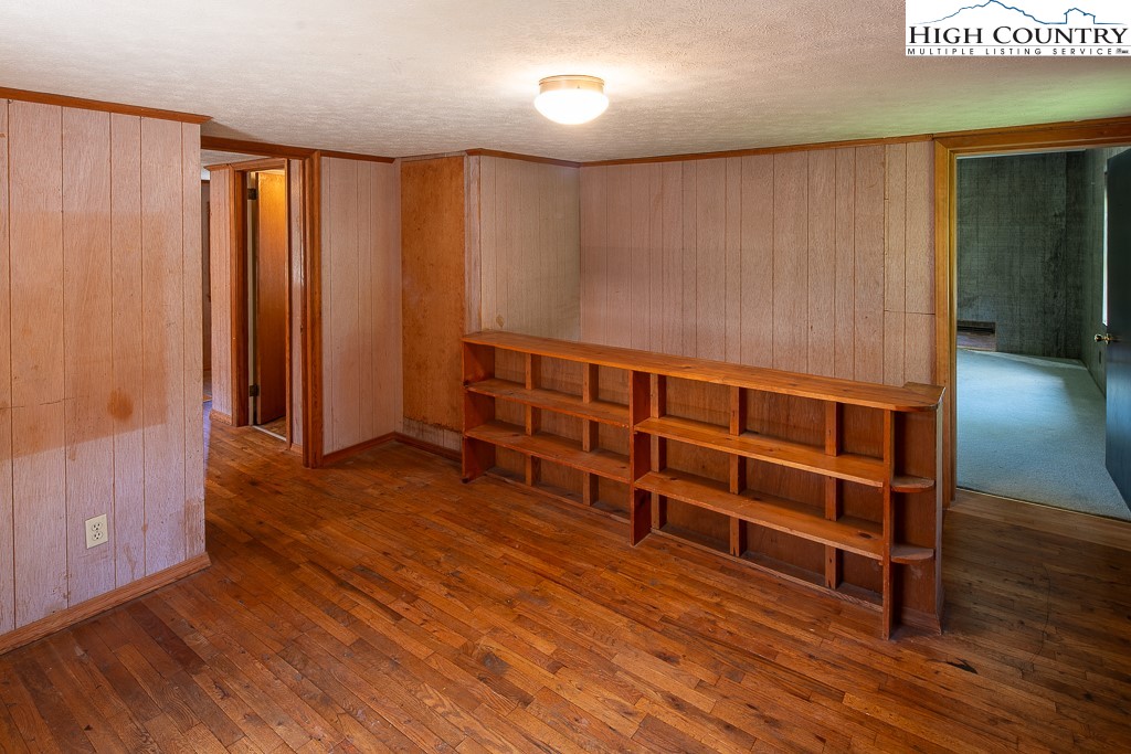 492 Payne Branch Road Boone, NC 28607 - Photo 38 of 49 a view of an empty room with wooden floor and a window