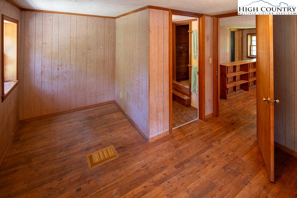 492 Payne Branch Road Boone, NC 28607 - Photo 42 of 49 an entryway with wooden floor and cabinet