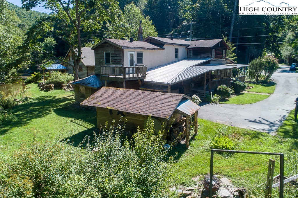 492 Payne Branch Road Boone, NC 28607 - Photo 46 of 49 a view of backyard with plants and outdoor seating