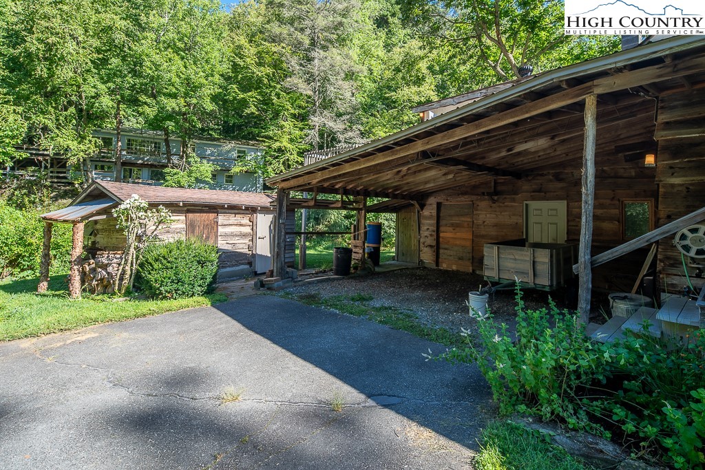 492 Payne Branch Road Boone, NC 28607 - Photo 5 of 49 a view of a backyard with plants