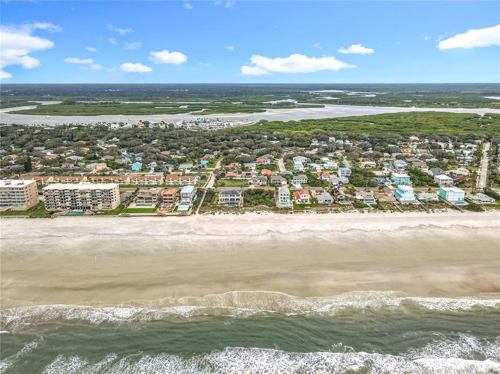 4748 Dixie Drive Ponce Inlet, FL 32127 - Photo 52 of 53 a view of an ocean and a mountain