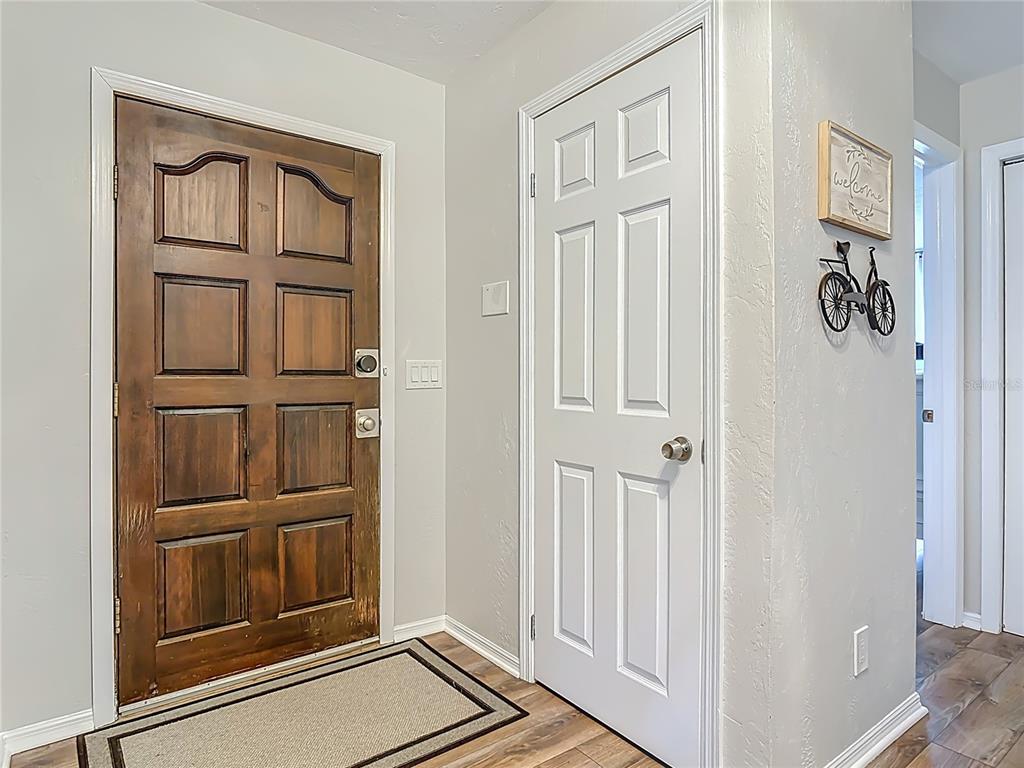 4748 Dixie Drive Ponce Inlet, FL 32127 - Photo 6 of 53 a view of front door