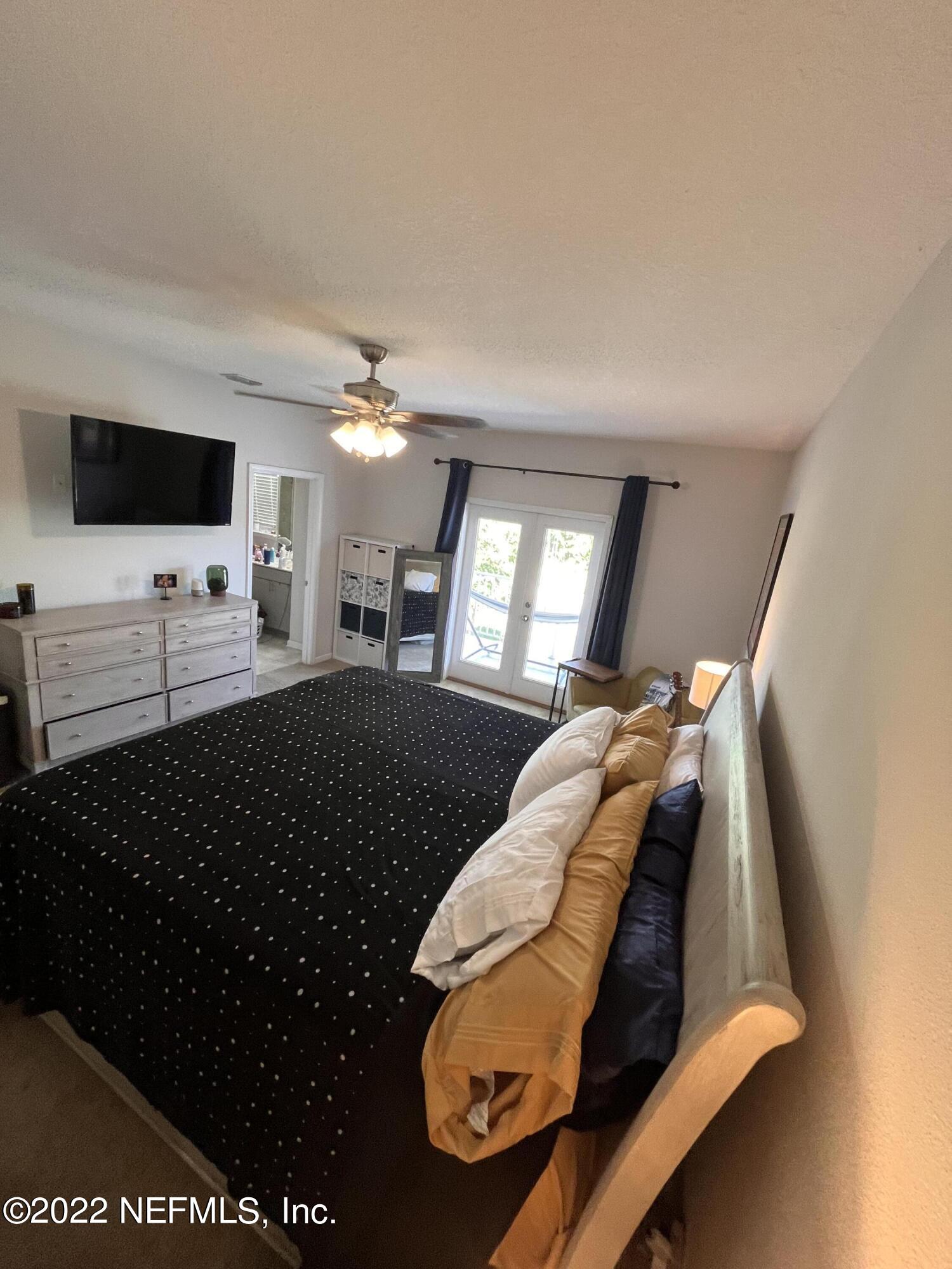 171 Ferndale Way St. Augustine, FL 32092 - Photo 13 of 35 a living room with furniture and a flat screen tv