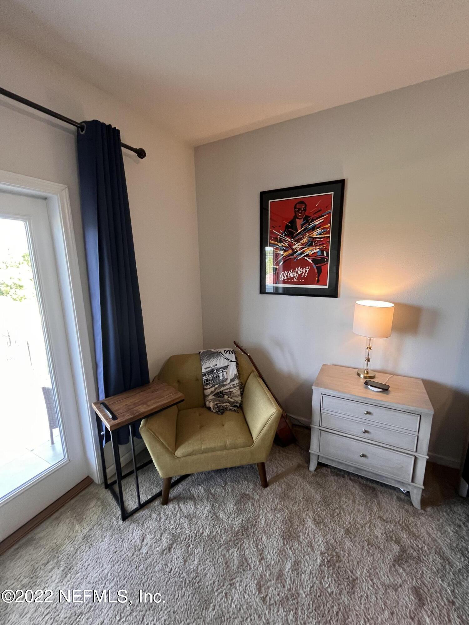 171 Ferndale Way St. Augustine, FL 32092 - Photo 14 of 35 a living room with furniture and a window