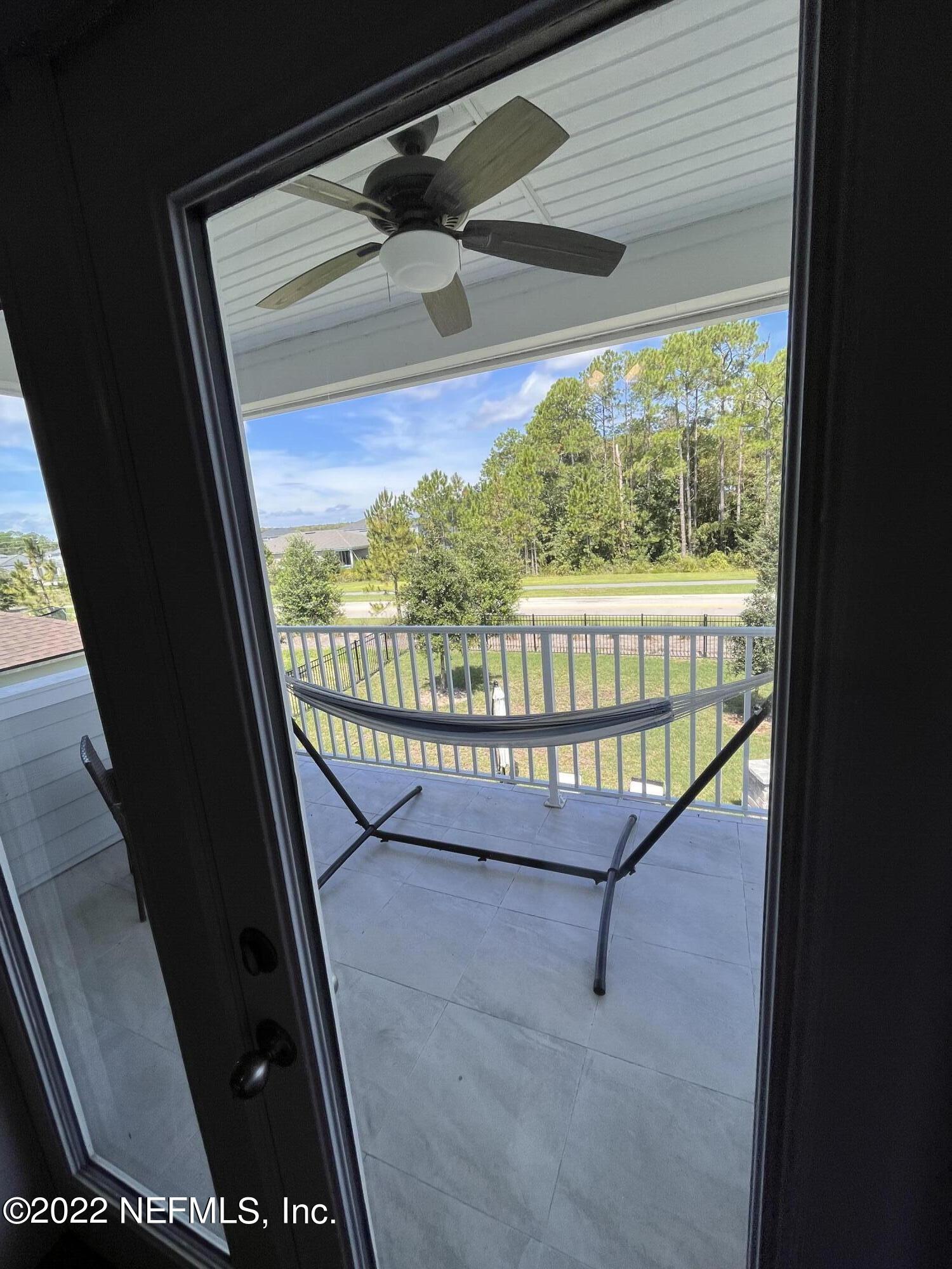 171 Ferndale Way St. Augustine, FL 32092 - Photo 19 of 35 a view of a glass door with a balcony
