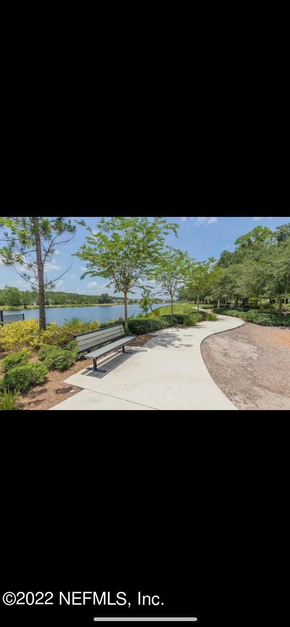 171 Ferndale Way St. Augustine, FL 32092 - Photo 27 of 35 a view of a yard with an outdoor seating