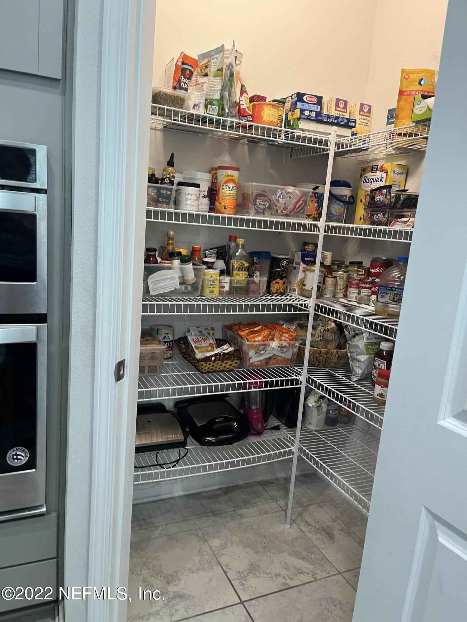 171 Ferndale Way St. Augustine, FL 32092 - Photo 8 of 35 a room with storage and utility