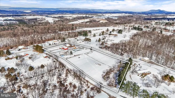 a living room with furniture or fireplace and a wooden floor