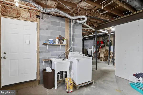 a blue bench sitting in front of a building