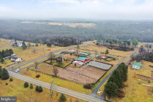 a view of a covered with snow in the backyard
