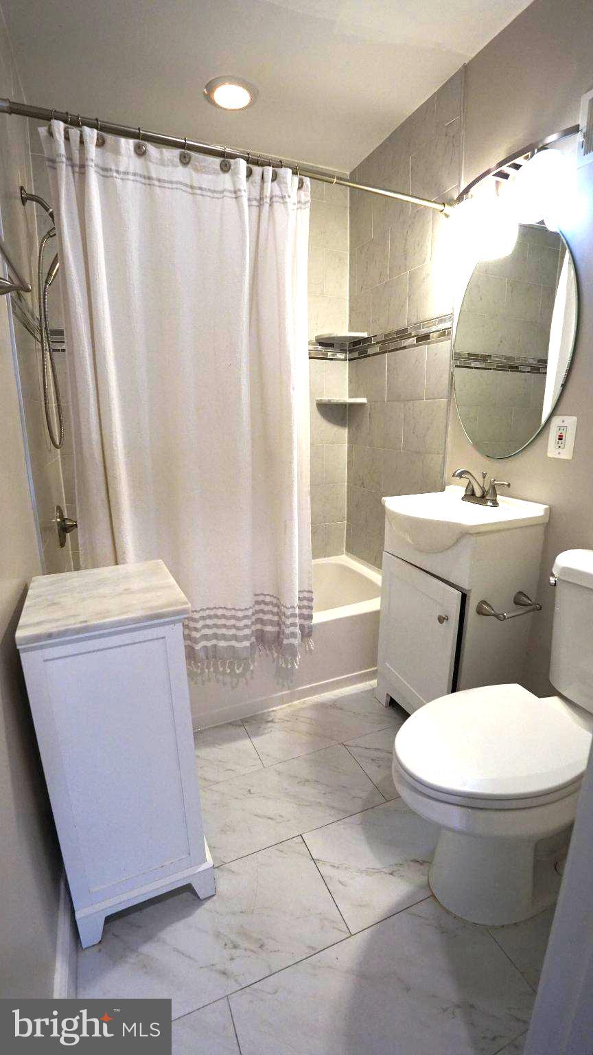 2006 Griffith Road Falls Church, VA 22043 - Photo 12 of 17 a bathroom with a sink toilet and shower