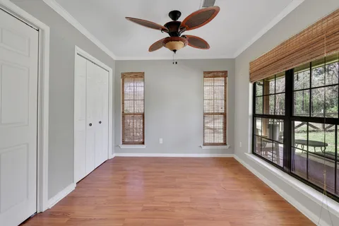 a view of an empty room with a window