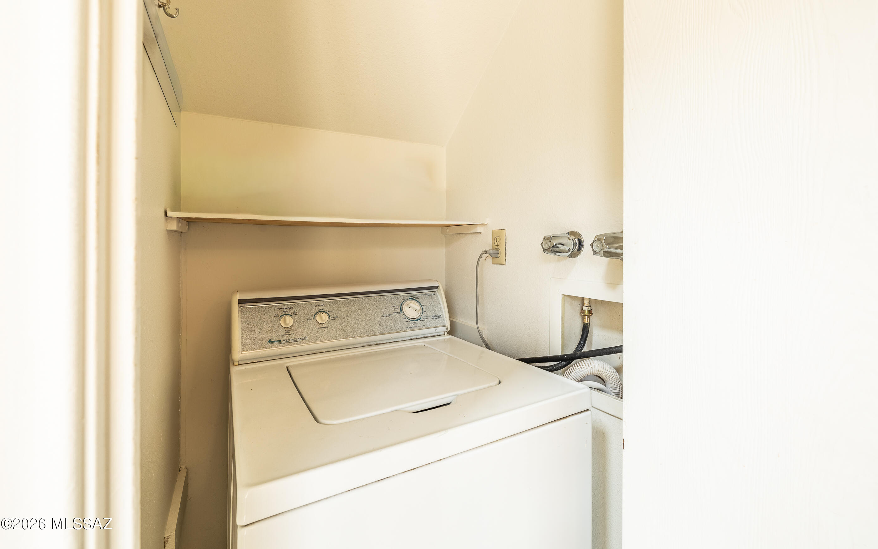 3750 North Country Club Road, Unit 46 Tucson, AZ 85716 - Photo 7 of 34 a utility room with dryer and washer